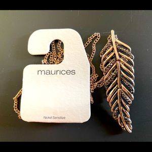 Gold tone metal hinged feather pendant necklace